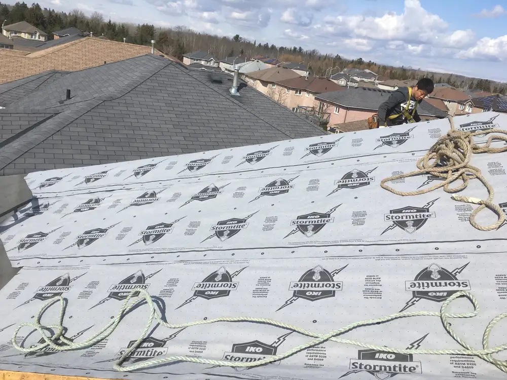Finished roof installation, sloped shingle roof